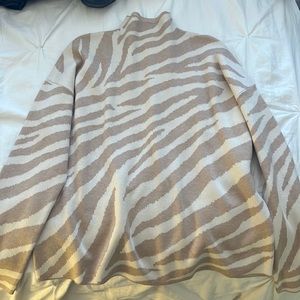 Neutral zebra print turtle neck sweater